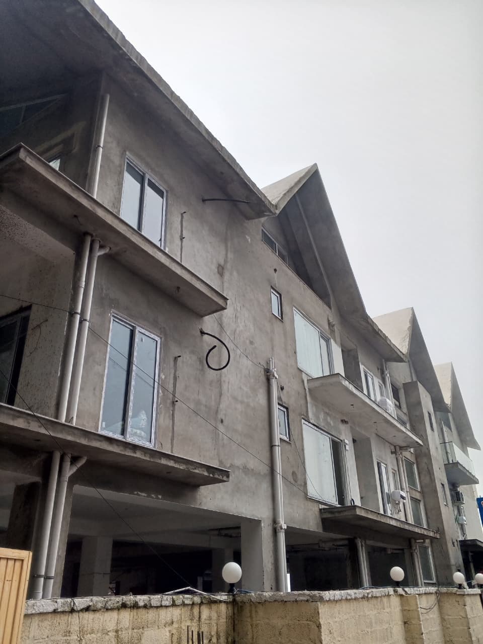 UPVC windows and balconies on the earthquake-resistant MYG Nathiagali building near Abbottabad